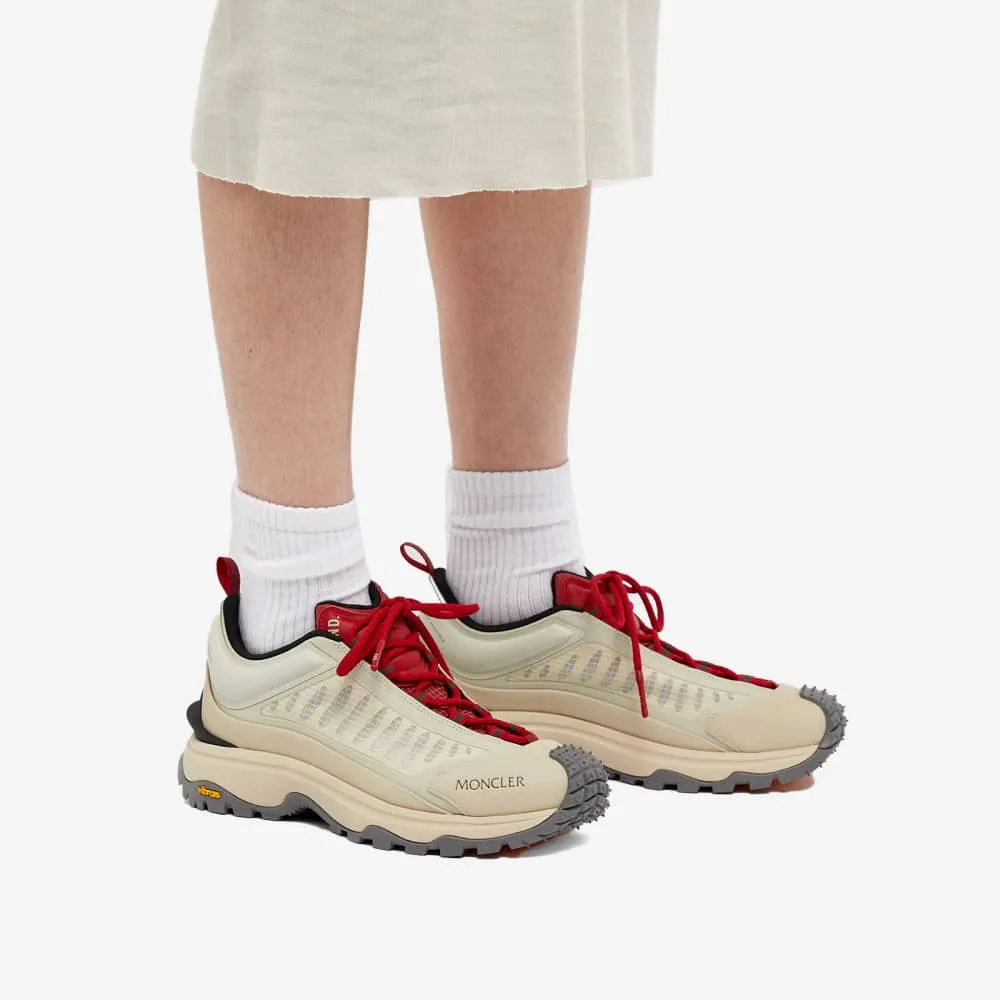 END. Lightweight Trailgrip sneakers in collaboration with Moncler, beige/red